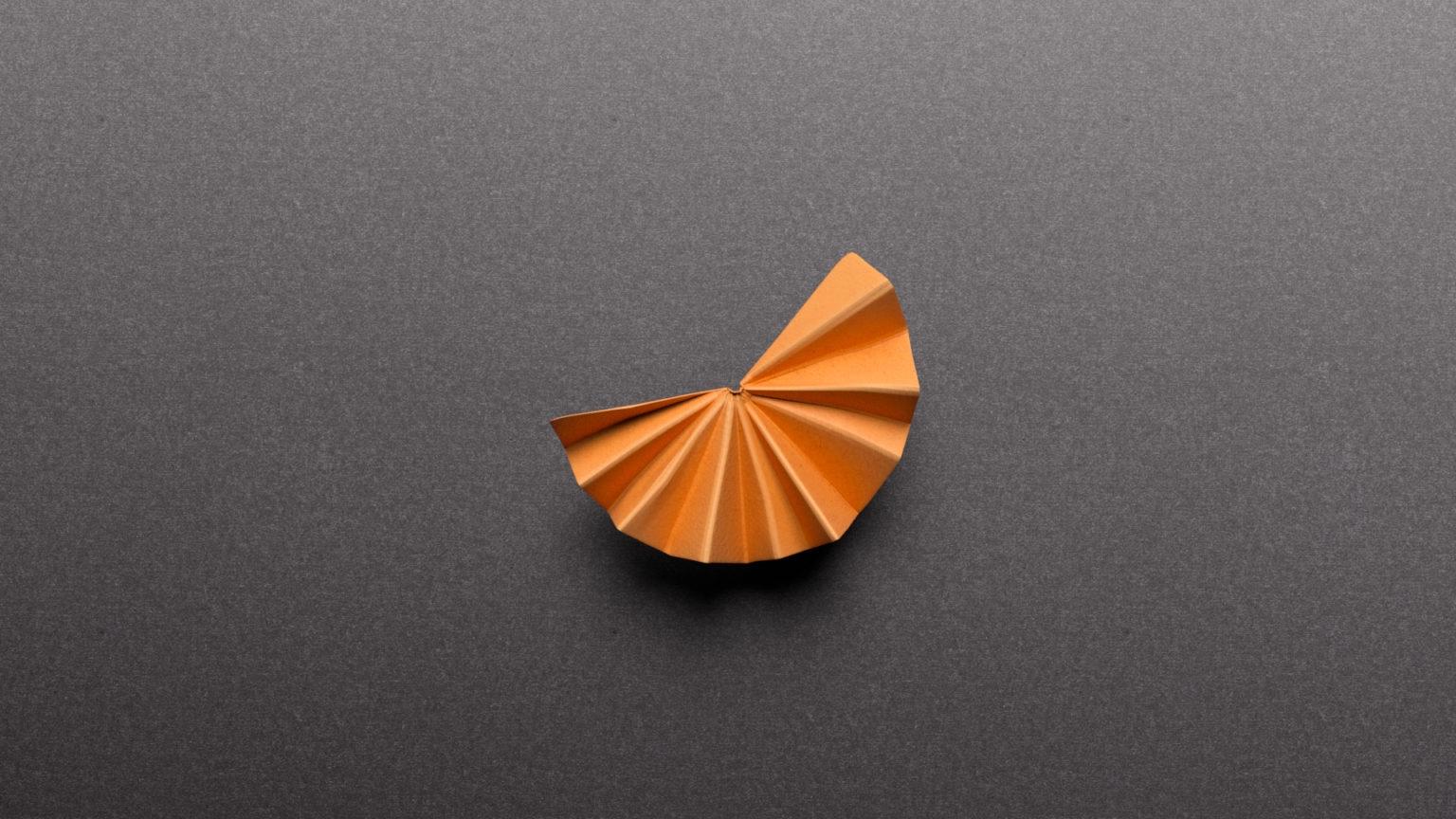 3D in paper art style of an orange slice designed for The Balvenie whisky inspired by Owen Gildersleeve